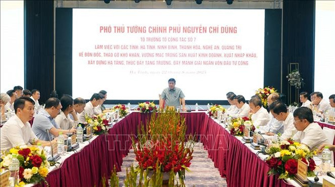 会议现场。图自越通社 vna-potal-thao-go-kho-khan-thuc-day-tang-truong-kinh-te-ben-vung-standjpg1.jpg