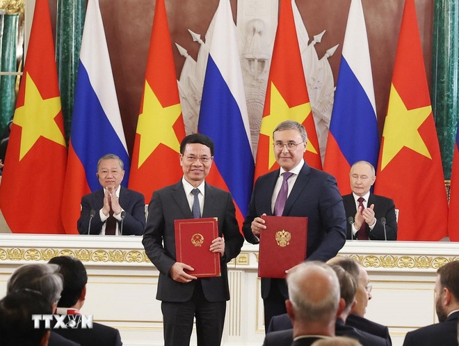 越共中央总书记苏林与俄罗斯总统普京出席两国科技部合作协议交换仪式。图自越通社 9.jpg