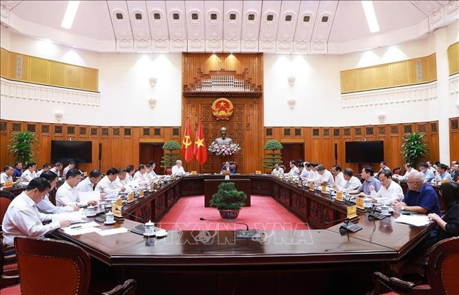 会议现场。图自越通社 du-an-ton-dong.jpg