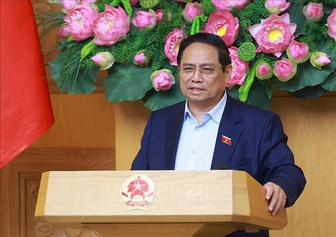 越南政府总理范明政发言。图自越通社 thu-tuong-230625.jpg