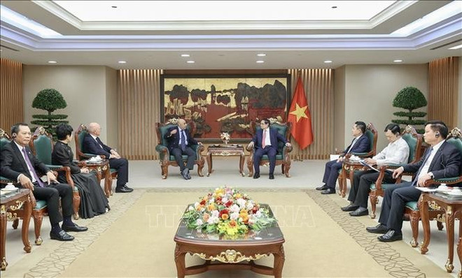 会见现场。图自越通社 hinh-anh-1.jpg