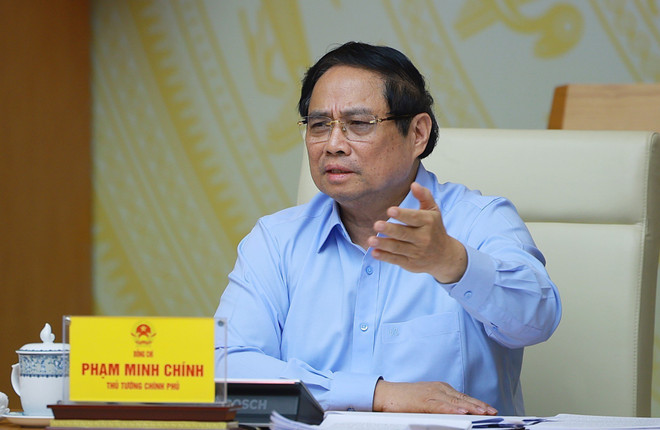 政府总理范明政在会议上发言。图自越通社 vna-potal-thu-tuong-chu-tri-hoi-nghi-toan-quoc-lan-thu-4-ve-thuc-day-dau-tu-cong-nam-2025-8346738.jpg