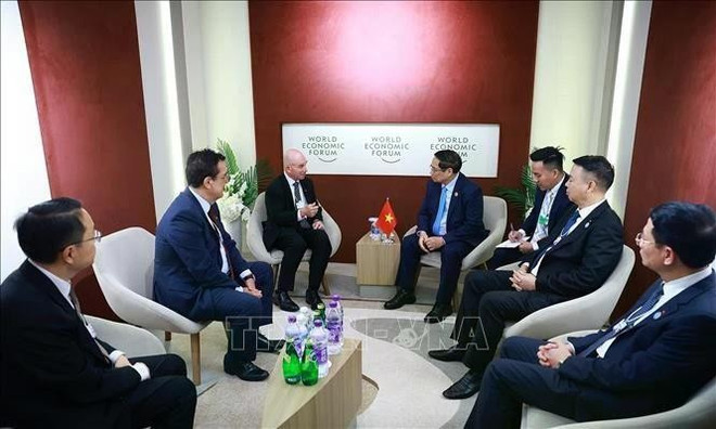 范明政总理会见美国Cisco集团亚太区总裁吴大维。图自越通社 1.jpg