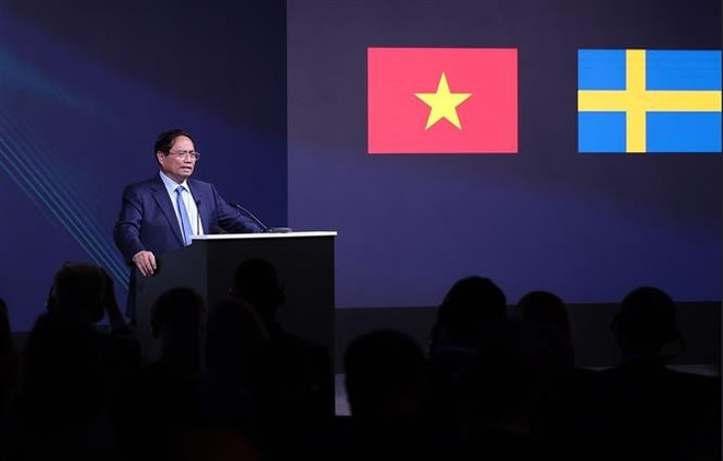 政府总理范明政在“绿色转型、数字化转型与创新”的越瑞企业论坛上发言。图自越通社 pham-minh-chinh-du-dien-dan-kinh-te-viet-nam-thuy-dien-8088842.jpg