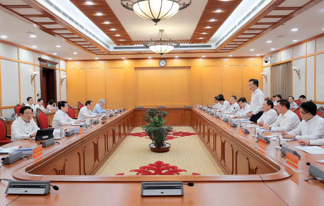 会议现场。图自越通社 vna-potal-chu-tich-nuoc-chu-tri-buoi-lam-viec-cua-bo-chinh-tri-voi-ban-thuong-vu-tinh-uy-hung-yen-8265358.jpg