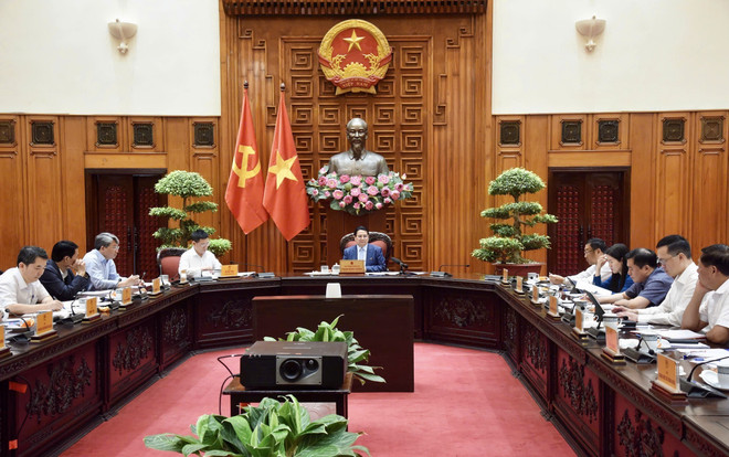 会议场景。图自越通社 uc-chinh-phu-hop-ve-chuan-bi-dam-phan-thuong-mai-voi-hoa-ky-8003104.jpg