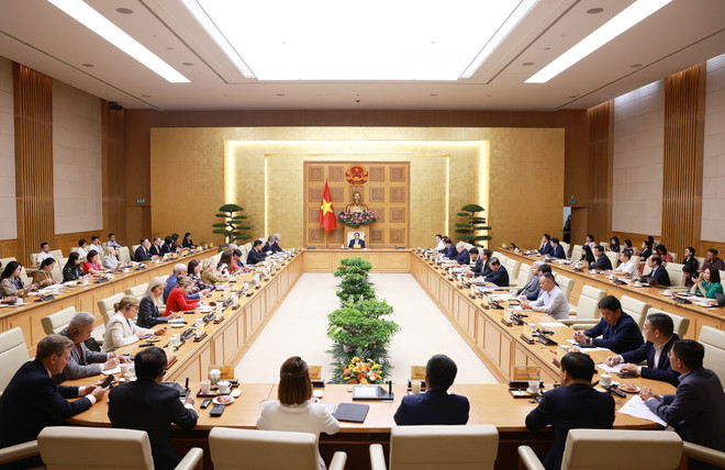 范明政总理会见美国—东盟商务理事会企业代表团现场。图自越通社 uong-lam-viec-voi-doan-hoi-dong-kinh-doanh-hoa-ky-asean-8144239.jpg