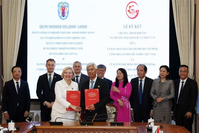 胡志明市人民委员会与白俄罗斯明斯克市执行委员会签署了“2024~2026年经贸和人文领域合作计划。图自越通社 2.jpg
