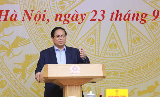 越南政府总理范明政发言。图自越通社 n-chi-dao-quoc-gia-ve-chong-khai-thac-hai-san-bat-hop-phap-8291560.jpg