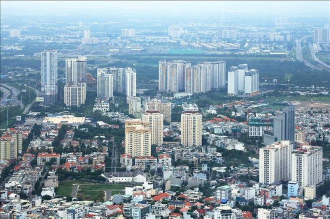 胡志明市一角。图自越通社 batdong-san1a.jpg