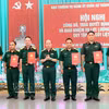 胡志明市司令部举行会议，公布成立烈士遗骸搜寻与归葬力量的决定。图片来源：越通社