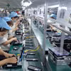 太原省恬瑞工业园区进行手机零部件组装。图片来源：越通社