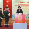 越南国家主席梁强来到河内市还剑坊第26投票区，出席第十六届国会代表和2026-2031年任期各级人民议会代表选举开幕式并投下自己的选票。图自越通社