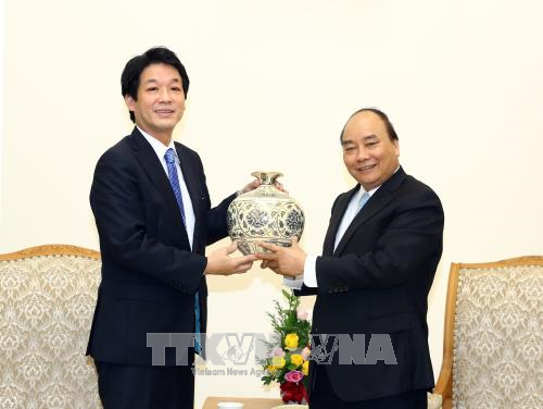 阮春福会见日本首相特别顾问其浦太郎 ảnh 1 阮春福会见日本首相特别顾问其浦太郎 ảnh 1