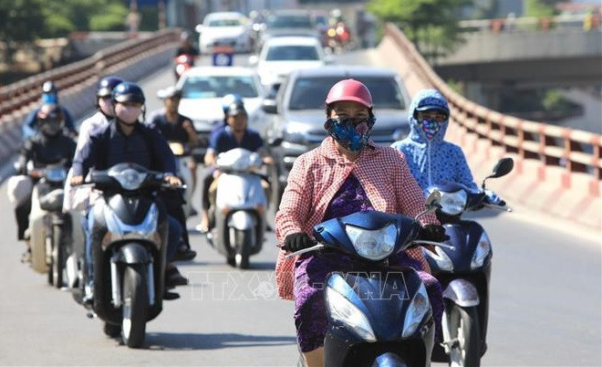 越南北部与中部地区炎热天气持续 最高气温35-37度 ảnh 1