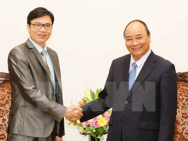 政府总理阮春福会见法国越裔专家与科学协会主席阮德姜 ảnh 1