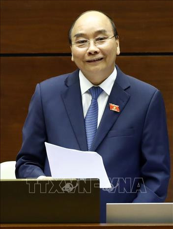 越南第十四届国会第八次会议:政府总理阮春福回答国会代表的询问 ảnh 1 越南第十四届国会第八次会议:政府总理阮春福回答国会代表的询问 ảnh 1