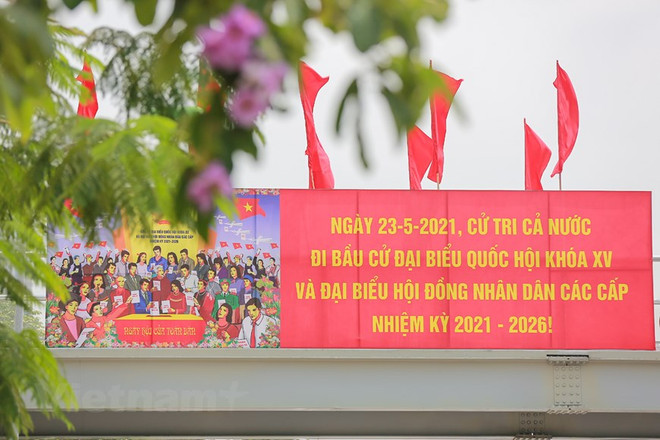 组图:河内市各地张灯结彩营造换届选举浓厚氛围 ảnh 10 组图:河内市各地张灯结彩营造换届选举浓厚氛围 ảnh 10