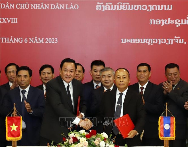 越老加强在老牺牲的越南志愿军和专家遗骸搜寻合作 ảnh 1