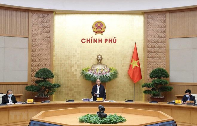 越南政府常务委员会举行会议讨论新冠肺炎疫情应对措施 ảnh 1 越南政府常务委员会举行会议讨论新冠肺炎疫情应对措施 ảnh 1