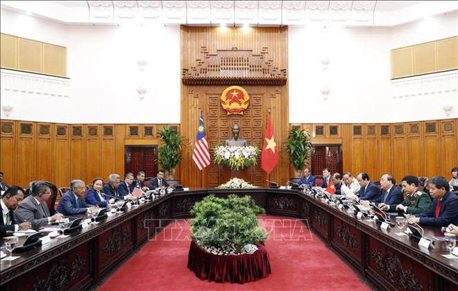 越南政府总理阮春福与马来西亚总理马哈蒂尔举行会谈 ảnh 2 越南政府总理阮春福与马来西亚总理马哈蒂尔举行会谈 ảnh 2