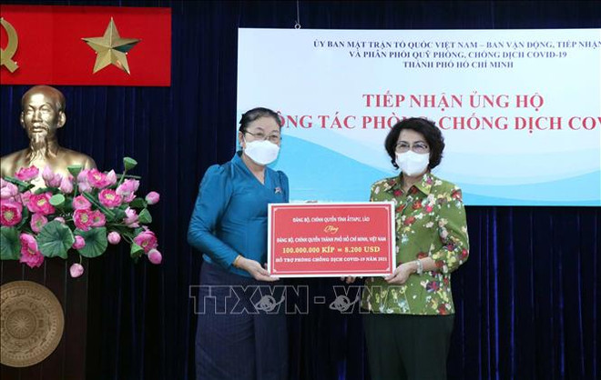 老挝阿苏破省向胡志明市新冠肺炎疫情防控工作提供援助 ảnh 1 老挝阿苏破省向胡志明市新冠肺炎疫情防控工作提供援助 ảnh 1