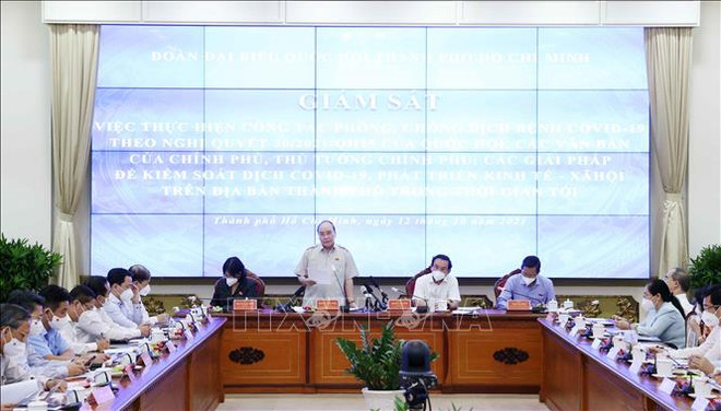 国家主席阮春福:控制好疫情是经济复苏的先决条件 ảnh 1 国家主席阮春福:控制好疫情是经济复苏的先决条件 ảnh 1