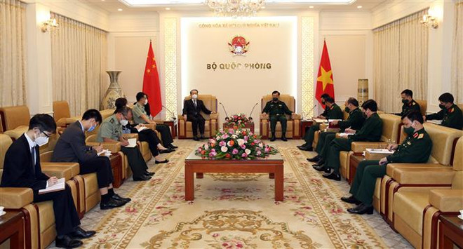 越南国防部副部长黄春战上将会见中国驻越南特命全权大使熊波 ảnh 2