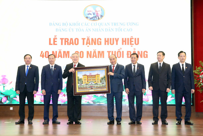 国家主席阮春福:建设公开透明、受民众监督的法院和司法体系 ảnh 1 国家主席阮春福:建设公开透明、受民众监督的法院和司法体系 ảnh 1