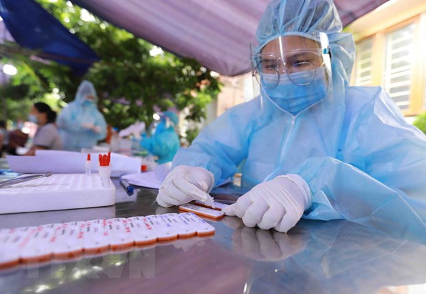 辛丑年最后一天 越南新增确诊病例下降超过1000例 ảnh 1