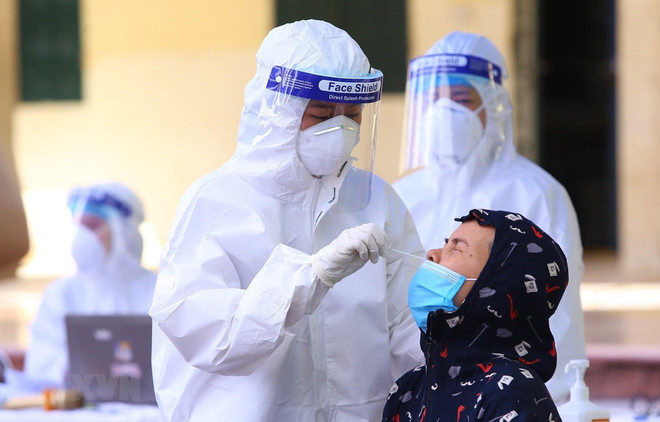 9月11日越南新增新冠肺炎确诊病例较昨日下降1379例 新增治愈出院病例12541例 ảnh 1