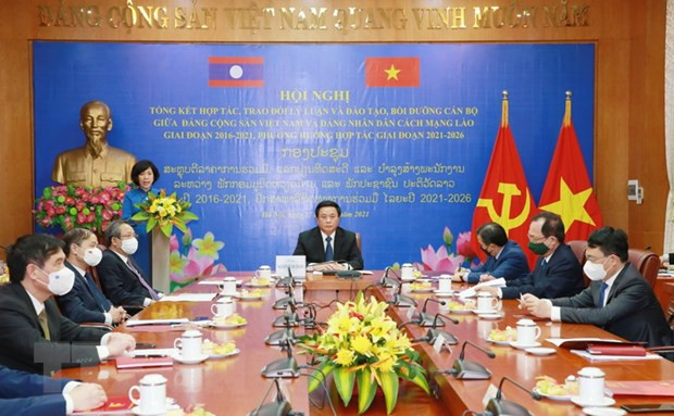 越老两党理论交流与合作及干部教育培训工作总结 ảnh 1 越老两党理论交流与合作及干部教育培训工作总结 ảnh 1