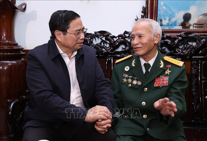 政府总理范明政:确保人人、家家户户都过上温暖、幸福和爱心春节 ảnh 2 政府总理范明政:确保人人、家家户户都过上温暖、幸福和爱心春节 ảnh 2