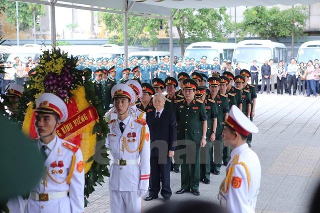越南党和国家领导出席CASA-212失事飞机9名飞行员遗体告别仪式 ảnh 1 越南党和国家领导出席CASA-212失事飞机9名飞行员遗体告别仪式 ảnh 1