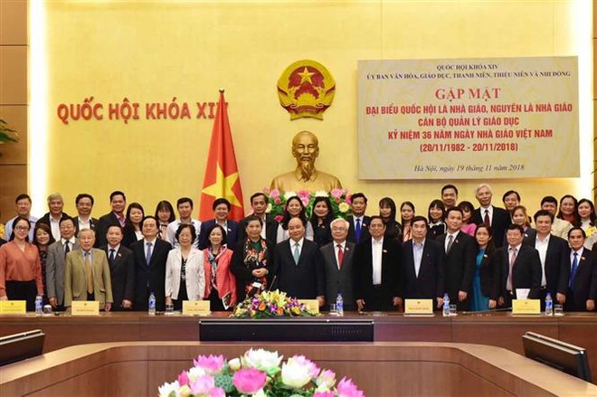 阮春福总理会见优秀教育管理工作者和教师代表 ảnh 2 阮春福总理会见优秀教育管理工作者和教师代表 ảnh 2