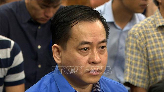 DAB损失3.6万亿越盾一案：陈方平和潘文英武出庭受审 ảnh 2