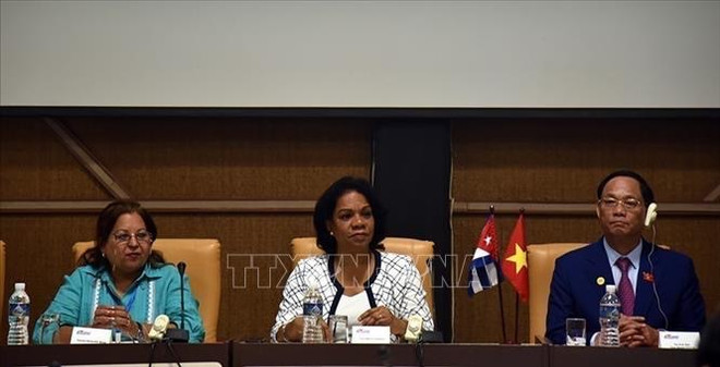 越南和古巴妇女在国家发展中的作用 ảnh 2