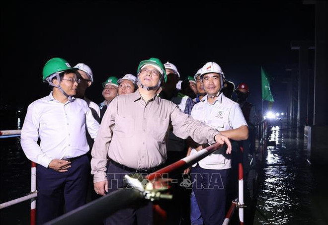 越南政府总理范明政视察前江省重要工程与项目 ảnh 2