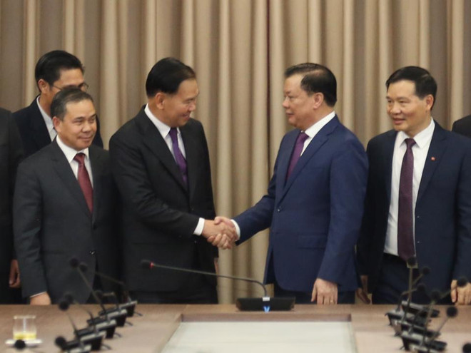 河内市委书记丁进勇会见老挝人民革命党中央办公厅主任通沙立·蒙诺梅 ảnh 1 河内市委书记丁进勇会见老挝人民革命党中央办公厅主任通沙立·蒙诺梅 ảnh 1