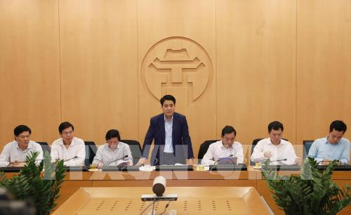 新冠肺炎疫情：河内市对韩国疫区来往河内人员采取严格防控措施 ảnh 1