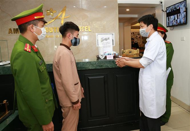 新冠肺炎疫情：河内加强外国人居留管理工作 ảnh 1