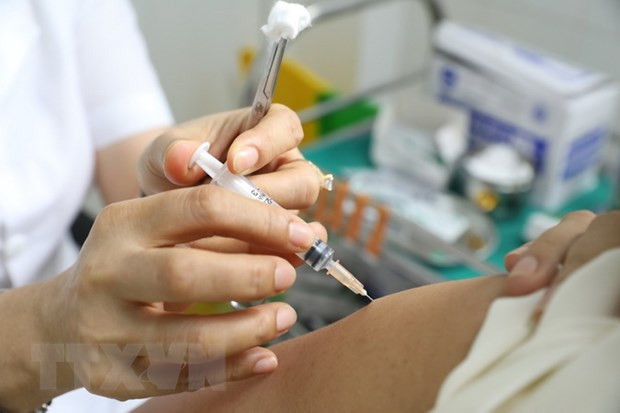 为在越南的外国非政府组织工作人员接种新冠疫苗 ảnh 1 为在越南的外国非政府组织工作人员接种新冠疫苗 ảnh 1