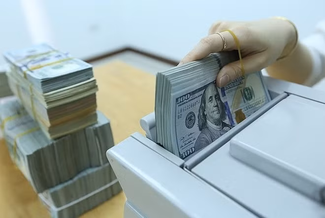7月15日上午越盾对美元汇率中间价上调1越盾 ảnh 1