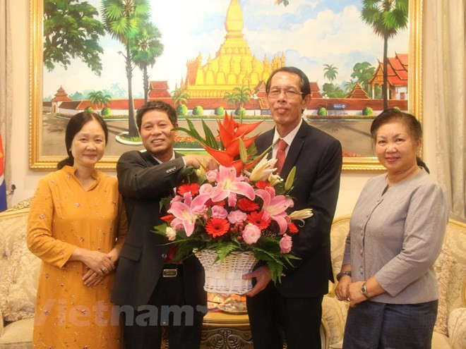 越南驻马来西亚大使馆祝贺老挝国庆43周年 ảnh 1 越南驻马来西亚大使馆祝贺老挝国庆43周年 ảnh 1