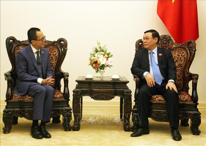 越南政府副总理王廷惠会见太平洋世纪集团总裁李泽楷 ảnh 2