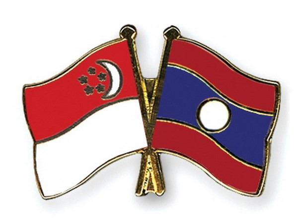 老挝外长对新加坡进行访问 ảnh 1