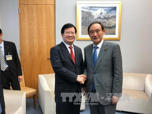 郑廷勇副总理会见日本内阁官房长官菅义伟 ảnh 1 郑廷勇副总理会见日本内阁官房长官菅义伟 ảnh 1