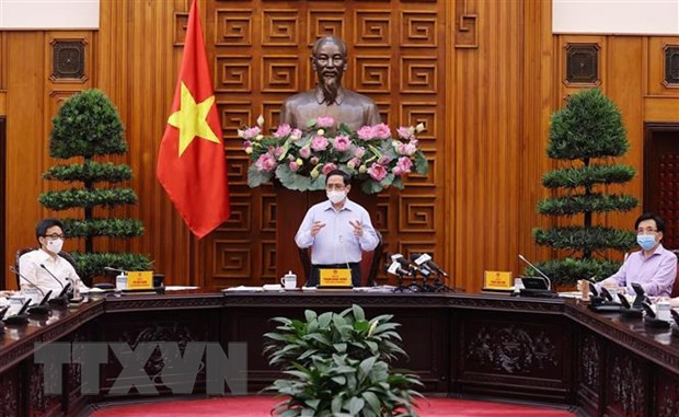 政府总理范明政：卫生部要攻坚克难，把人民群众健康安全摆在首要位置 ảnh 2