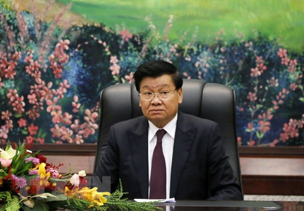 老挝总书记、国家主席致函感谢越共中央总书记和国家主席 ảnh 1 老挝总书记、国家主席致函感谢越共中央总书记和国家主席 ảnh 1