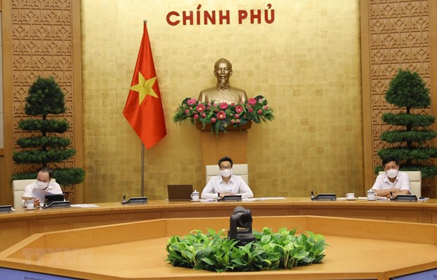 政府副总理武德儋：新冠肺炎疫情已在社区蔓延 各地方须保持高度警惕 ảnh 1